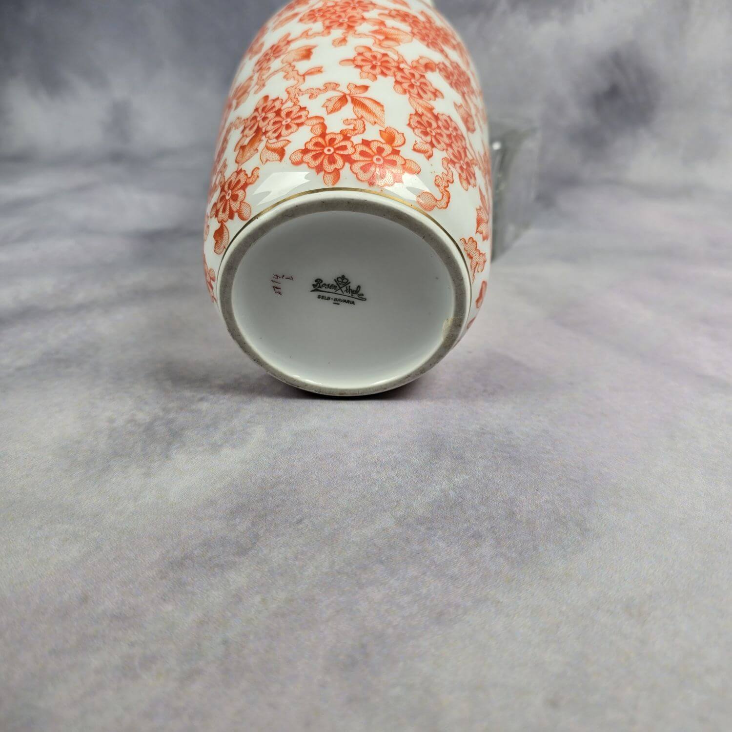 Rosenthal Vase mit orangen Blüten