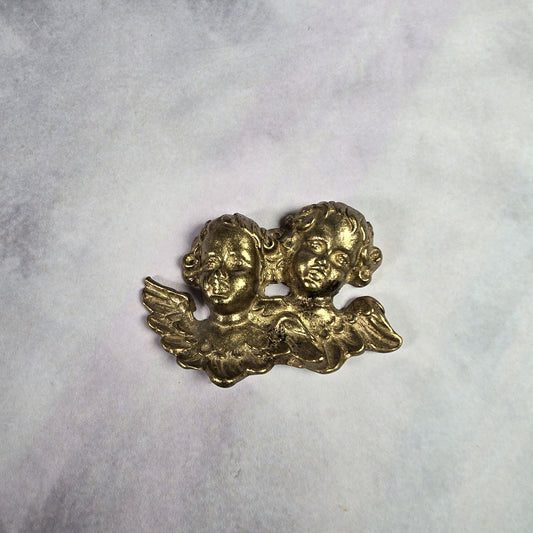 Putti - Engelsköpfe aus Messing