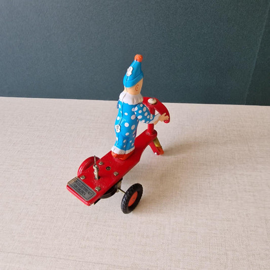 Vintage mechanisches Blechspielzeug - Clown auf Dreirad Roller - Aufziehspielzeug